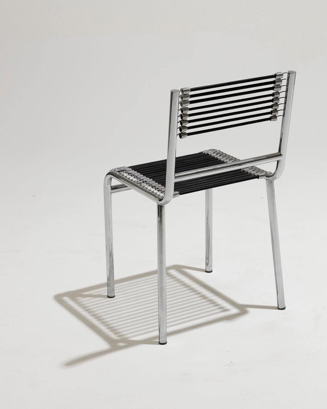 SET OF 4 STEEL AND ELASTIC ROPE CHAIRS, RENÉ HERBST, 1970s 