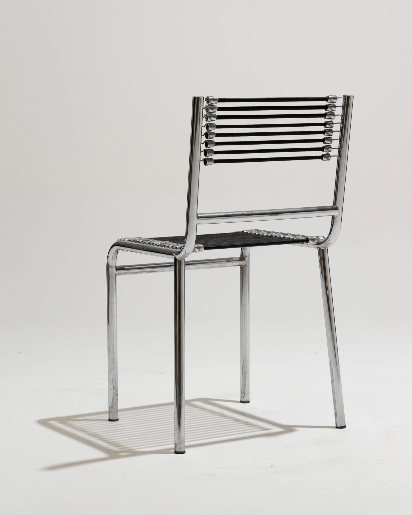 CHAISE EN ACIER ET CORDE ÉLASTIQUE, RENÉ HERBST, 1970s