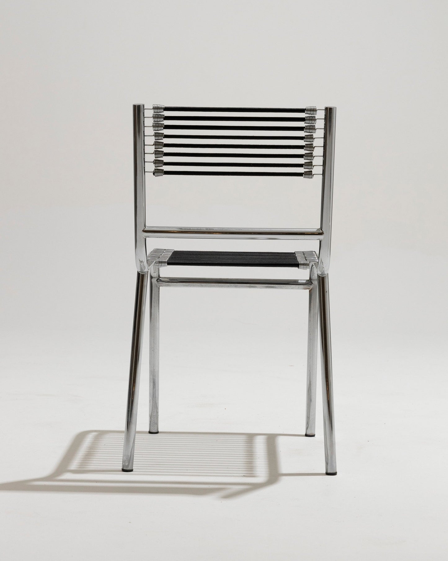 CHAISE EN ACIER ET CORDE ÉLASTIQUE, RENÉ HERBST, 1970s