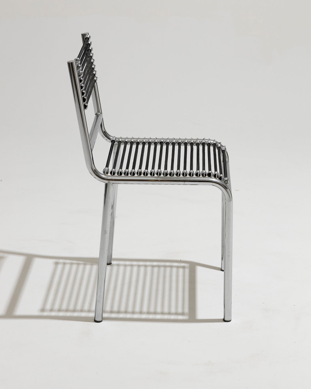 SET OF 4 STEEL AND ELASTIC ROPE CHAIRS, RENÉ HERBST, 1970s 