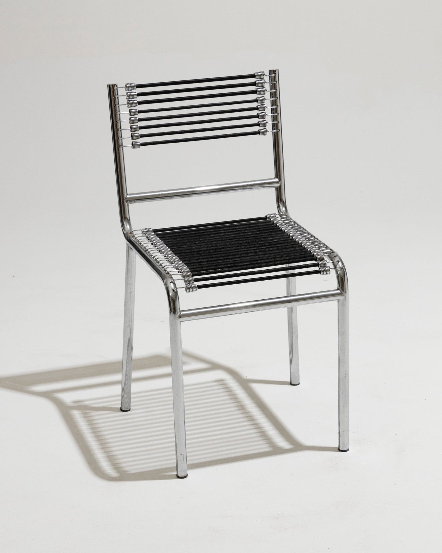 CHAISE EN ACIER ET CORDE ÉLASTIQUE, RENÉ HERBST, 1970s