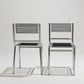 PAIR OF STEEL AND ELASTIC CORD CHAIRS, RENÉ HERBST, 1970s