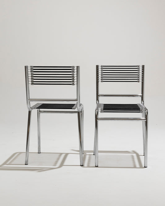 PAIR OF STEEL AND ELASTIC CORD CHAIRS, RENÉ HERBST, 1970s