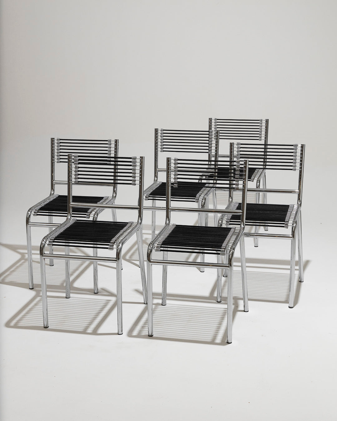 SET OF 6 STEEL AND ELASTIC ROPE CHAIRS, RENÉ HERBST, 1970s 