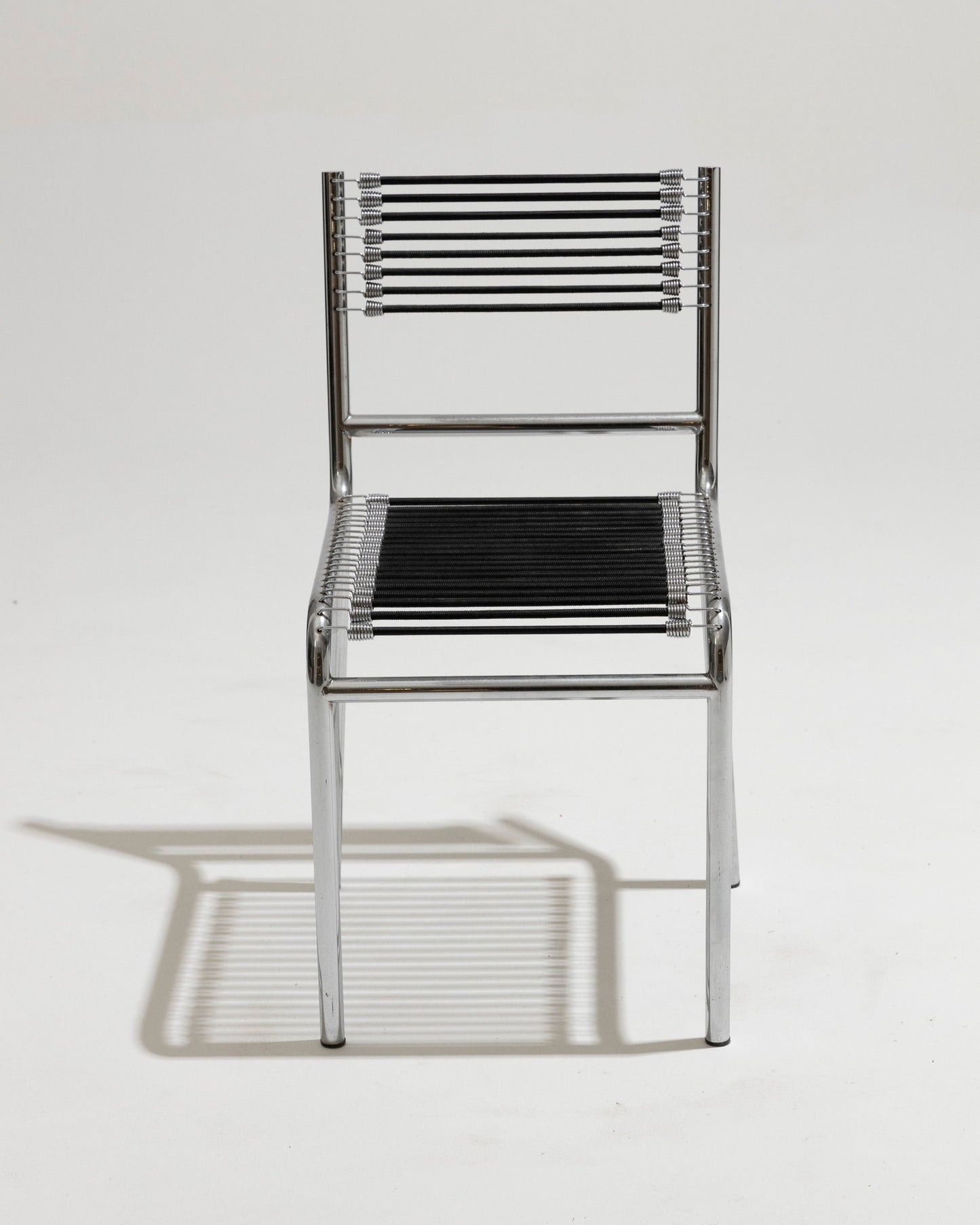 CHAISE EN ACIER ET CORDE ÉLASTIQUE, RENÉ HERBST, 1970s