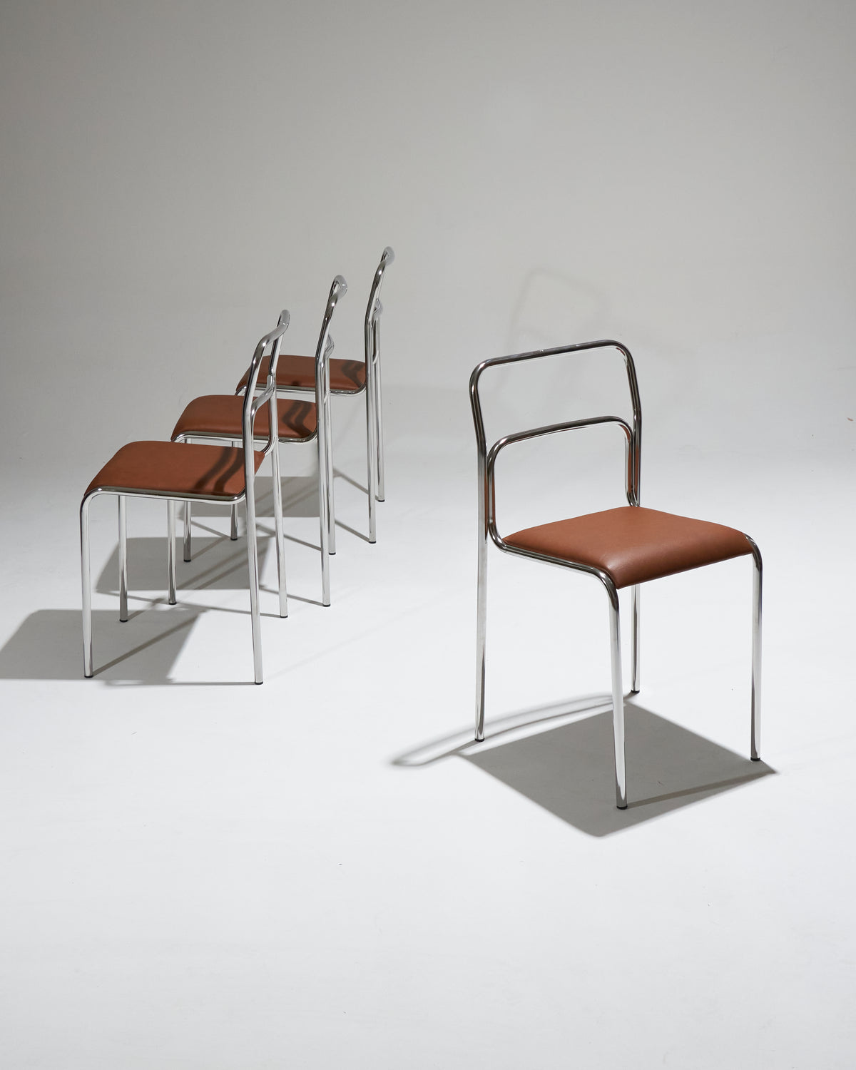 SET OF 4 TUBULAR AND LEATHER STEEL CHAIRS, 1980S