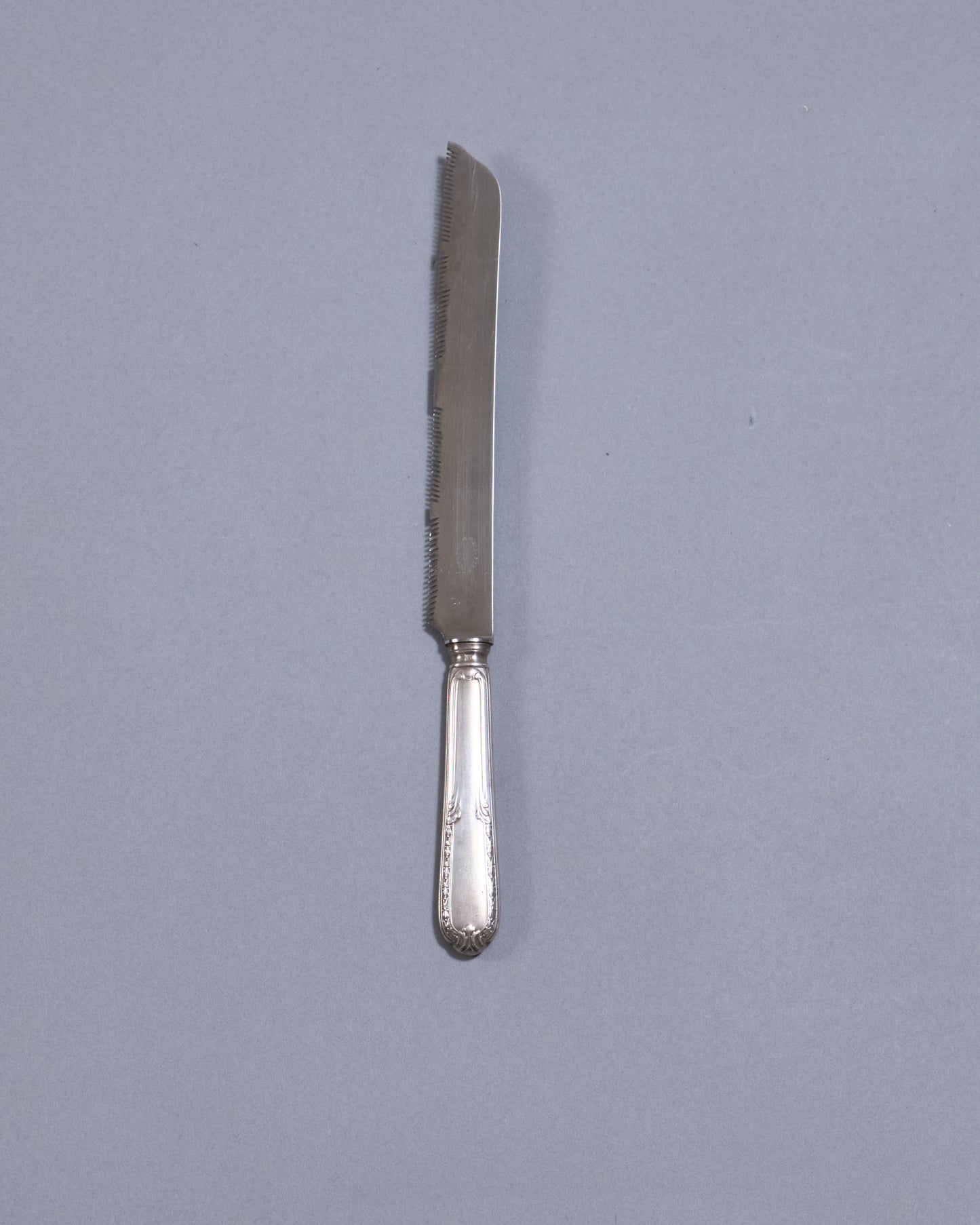 Metal bread knife, 1950s