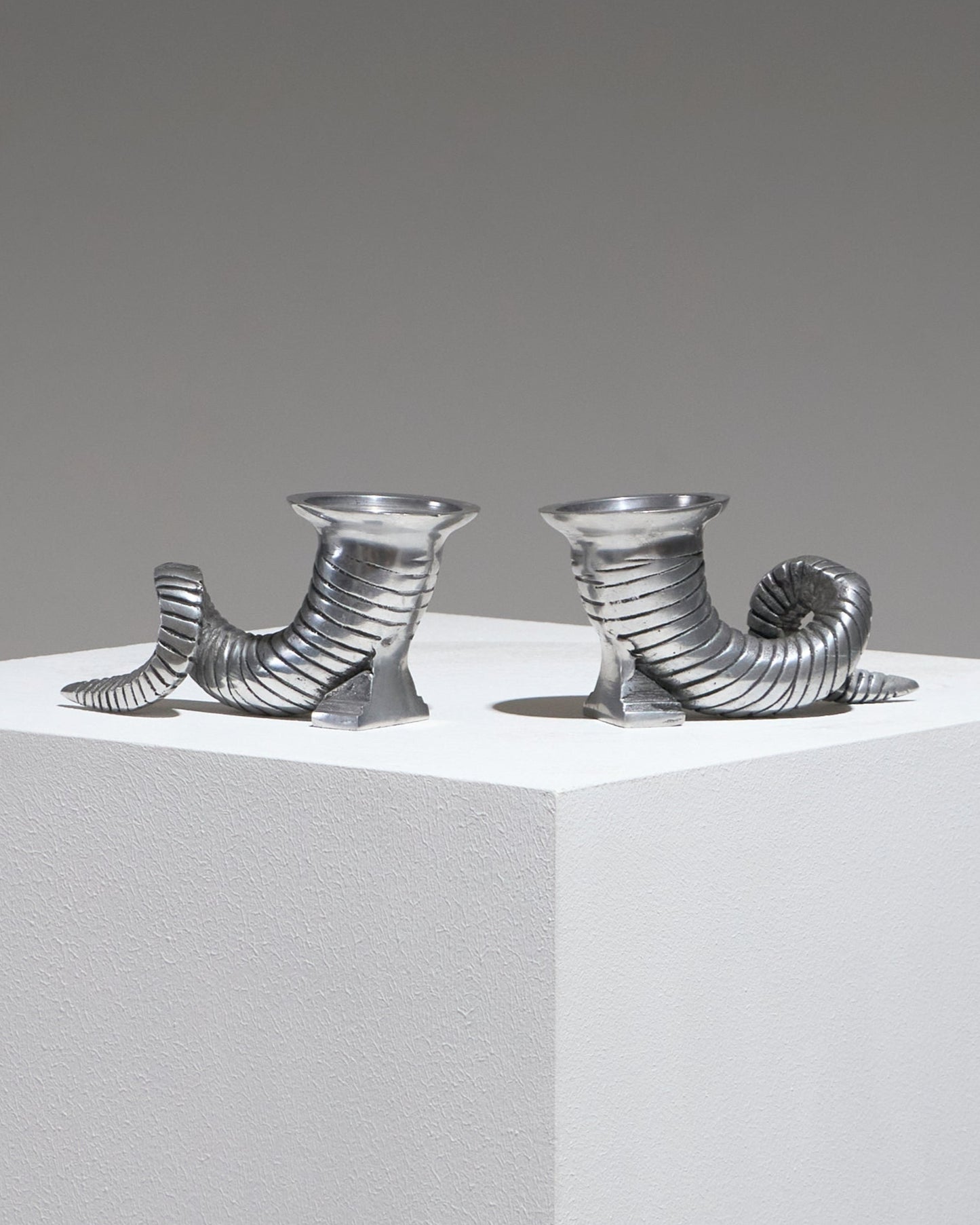 Pair of silver-plated horn candlesticks, 1960s