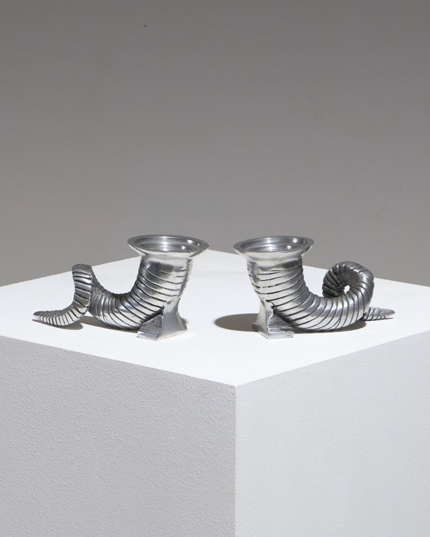 Pair of silver-plated horn candlesticks, 1960s