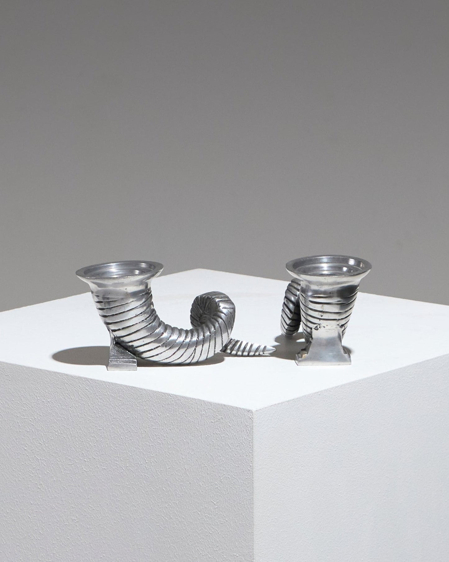 Pair of silver-plated horn candlesticks, 1960s