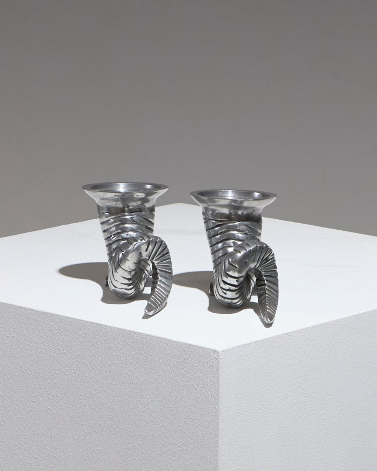 Pair of silver-plated horn candlesticks, 1960s