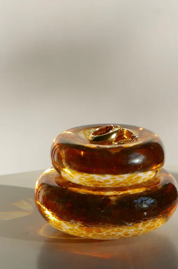 TWO “PEBBLE STACK” GLASS PEBBLES