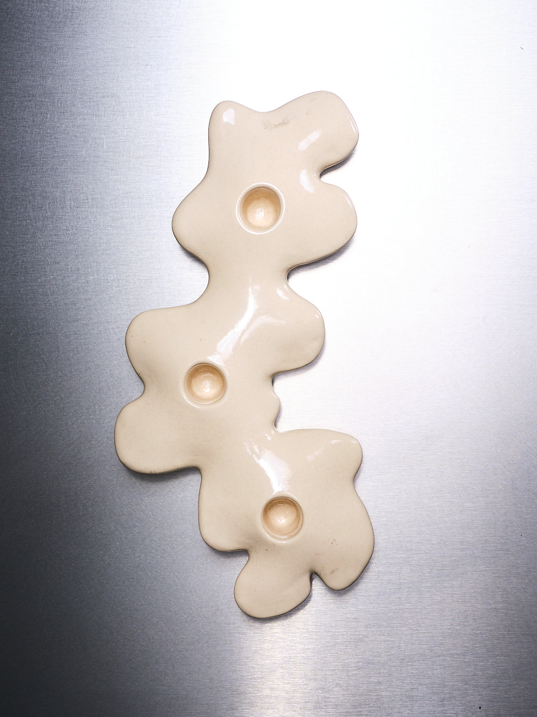 Triple sandstone candlestick