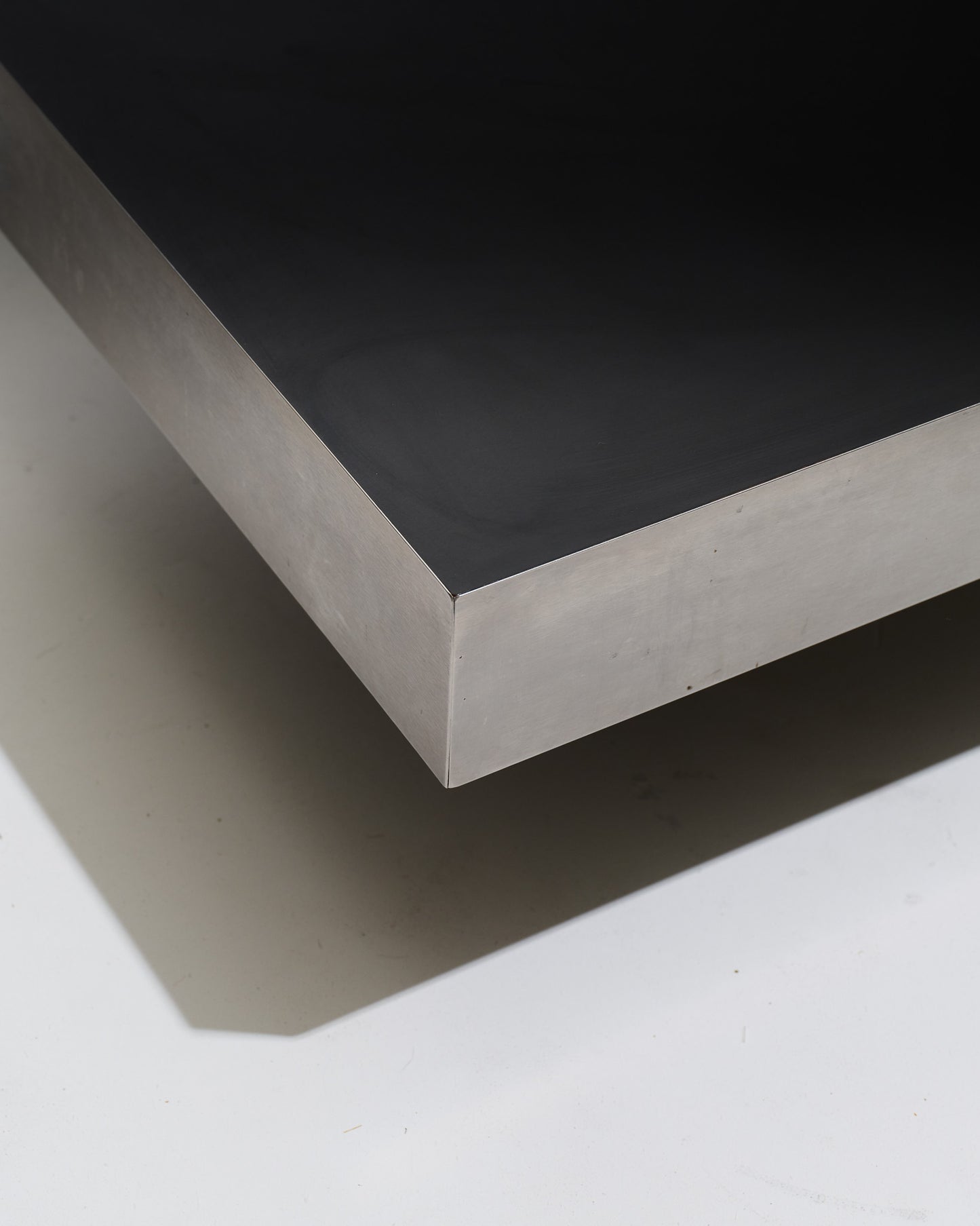 Black wood coffee table with metal rim