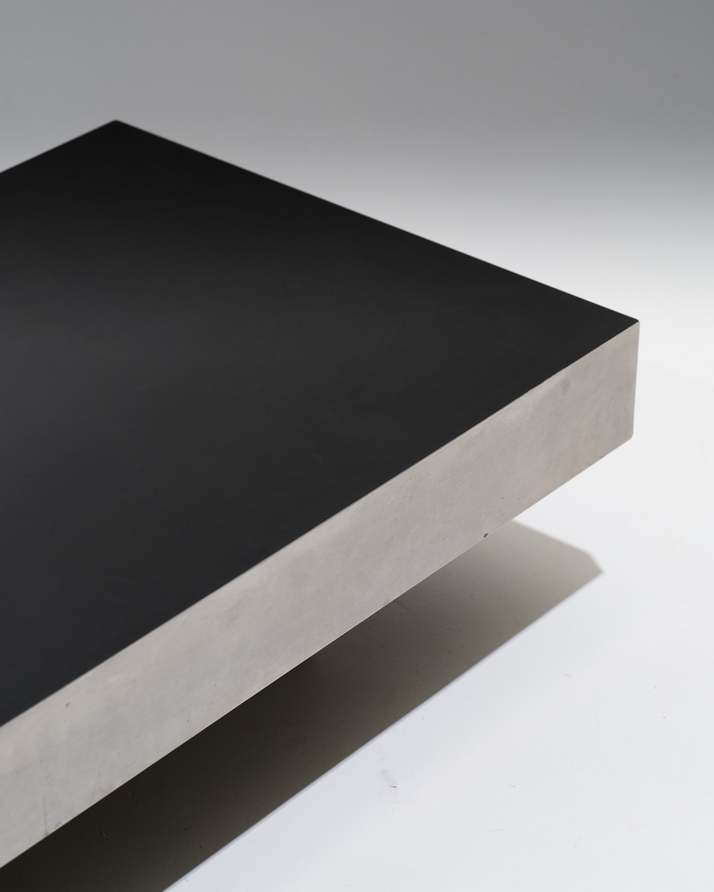 Black wood coffee table with metal rim