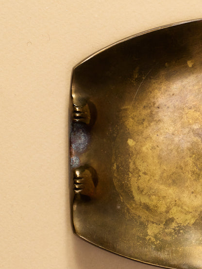 A bronze owl-shaped trinket tray 