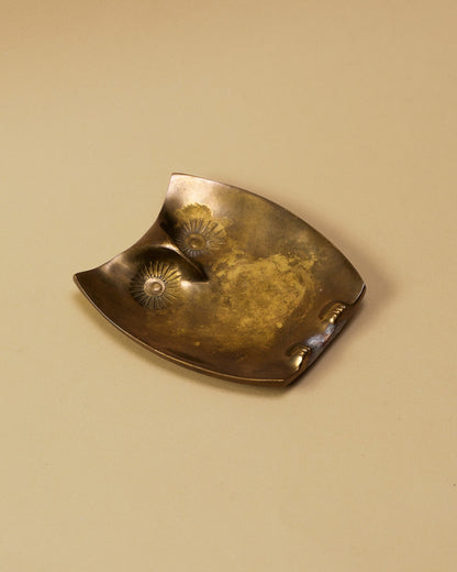 A bronze owl-shaped trinket tray 