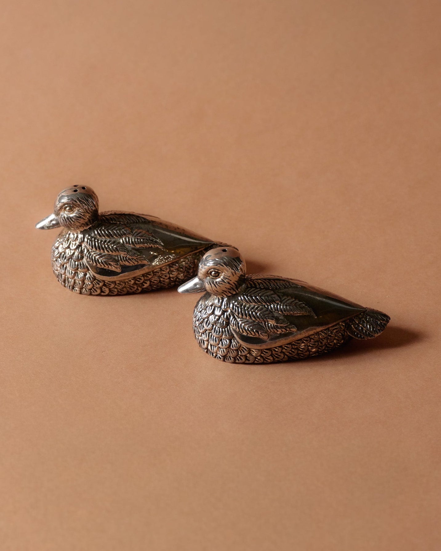 'DUCK' SILVER-PLATED METAL SALT AND PEPPER SHAKERS