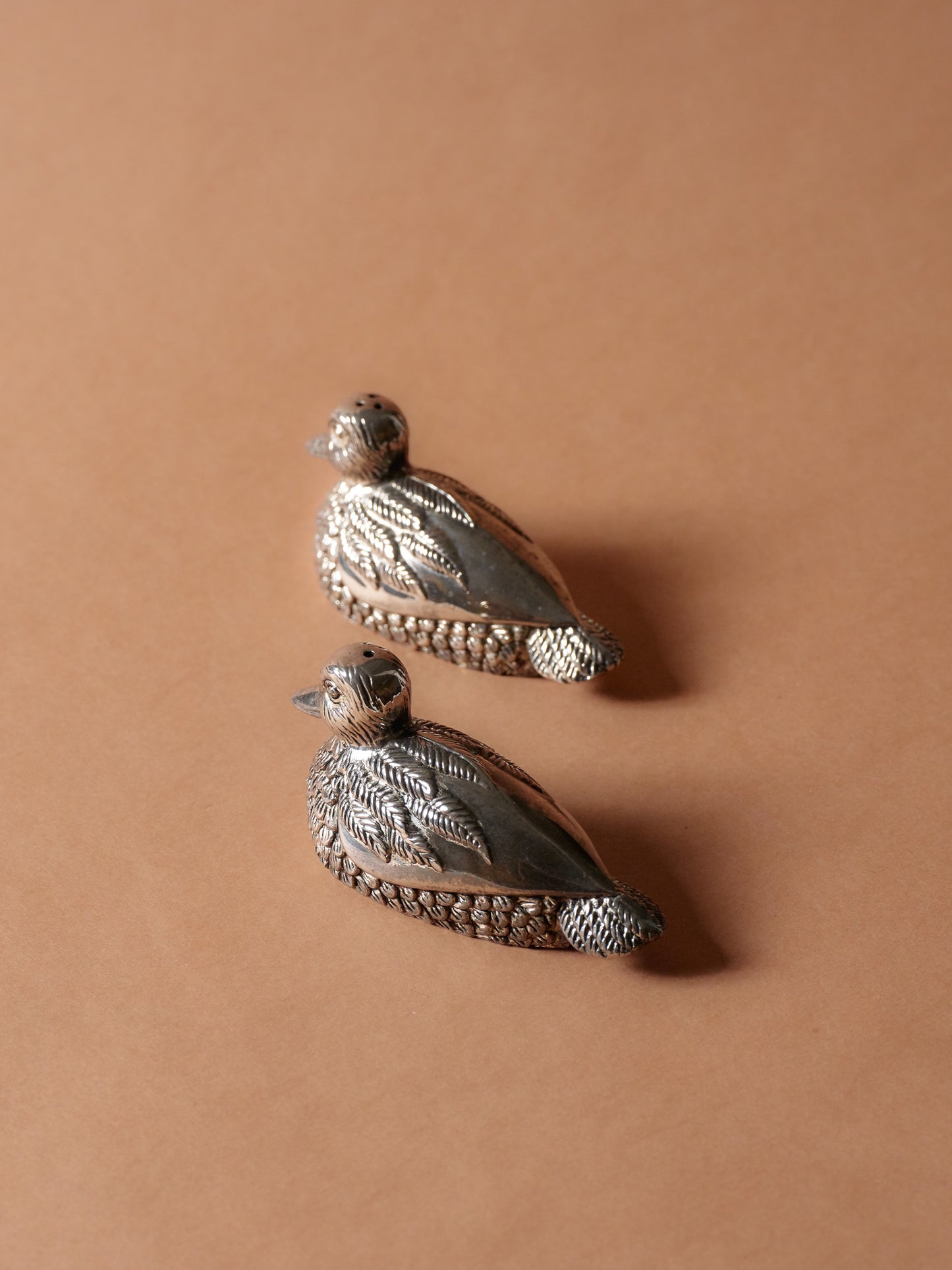 'DUCK' SILVER-PLATED METAL SALT AND PEPPER SHAKERS