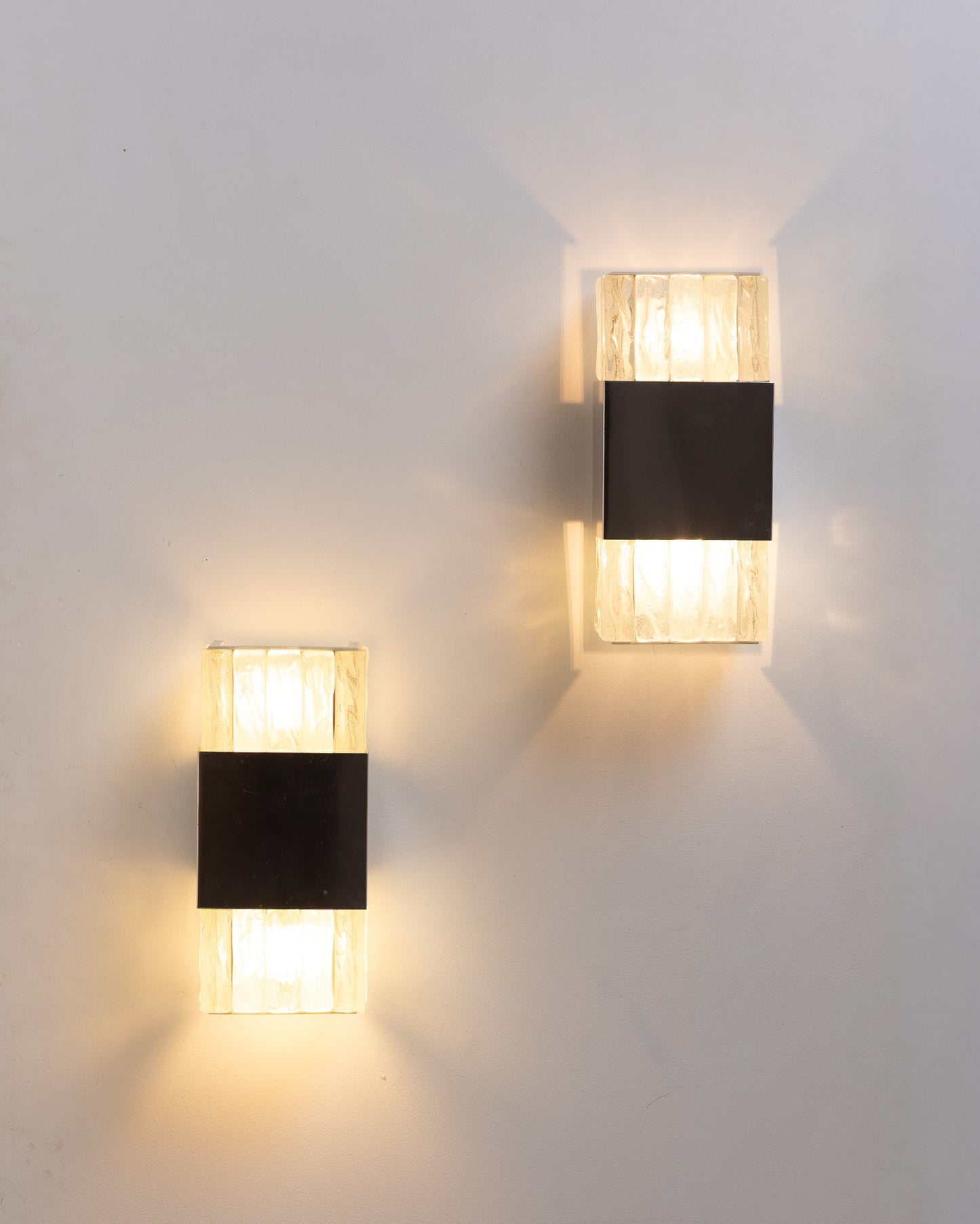 PAIR OF METAL AND GLASS WALL SCONCES, ATELIERS PERZEL