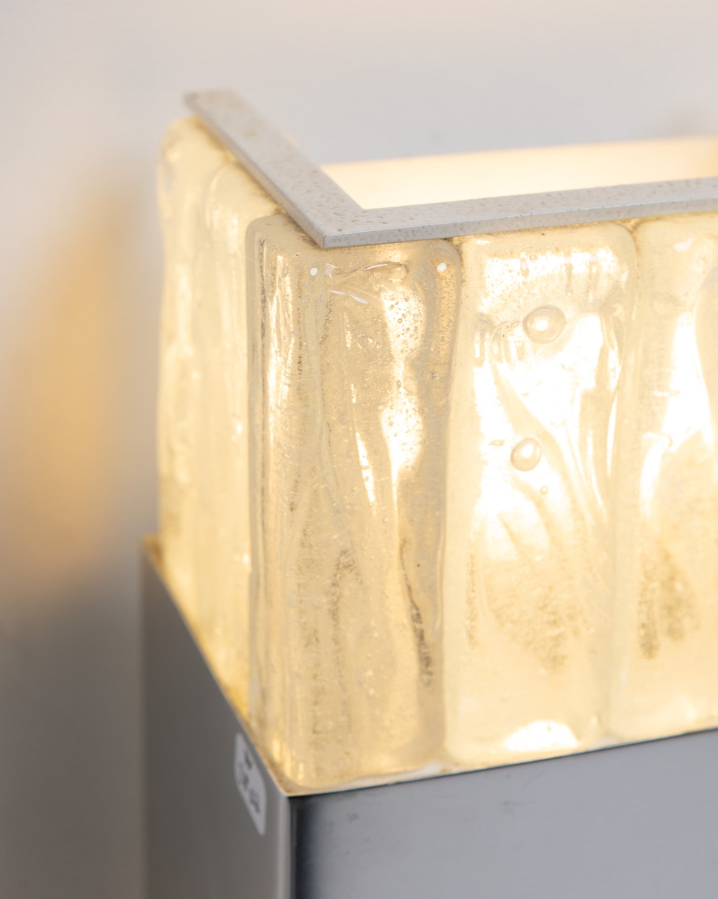 PAIR OF METAL AND GLASS WALL SCONCES, ATELIERS PERZEL