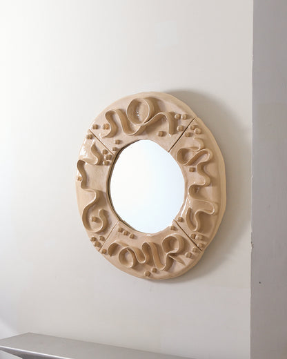 Enamelled ceramic mirror 
