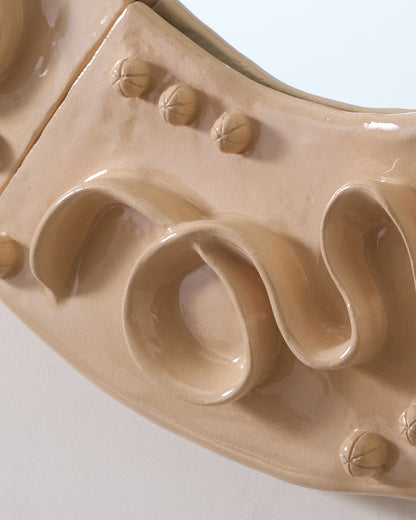 Enamelled ceramic mirror 