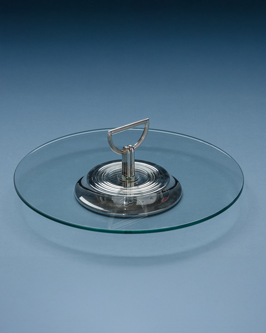 Plateau à fromage Christofle, modèle vibrations. Monture en métal argenté avec plateau en verre amovible. Cachet Christofle sous la base.
Bel état général.