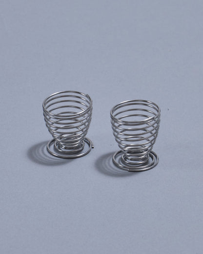PAIR OF METAL SPRING EGG CUPS