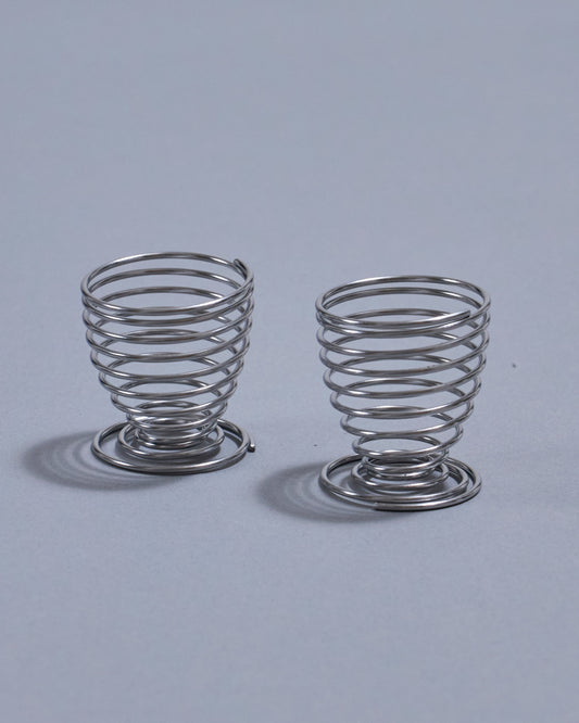 PAIR OF METAL SPRING EGG CUPS