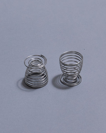 PAIR OF METAL SPRING EGG CUPS