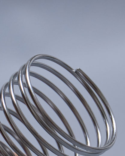 PAIR OF METAL SPRING EGG CUPS