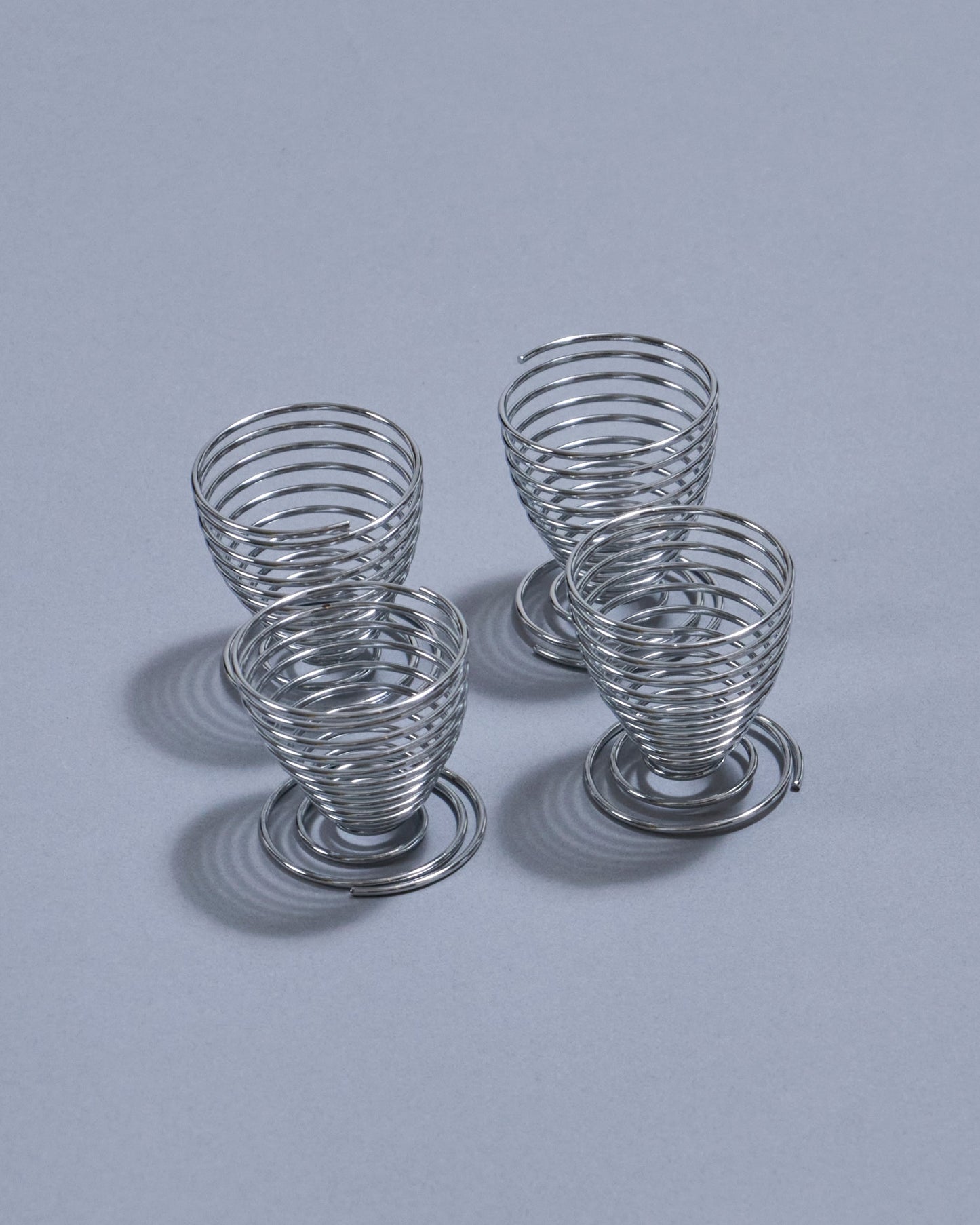 SET OF 4 METAL SPRING EGG CUPS