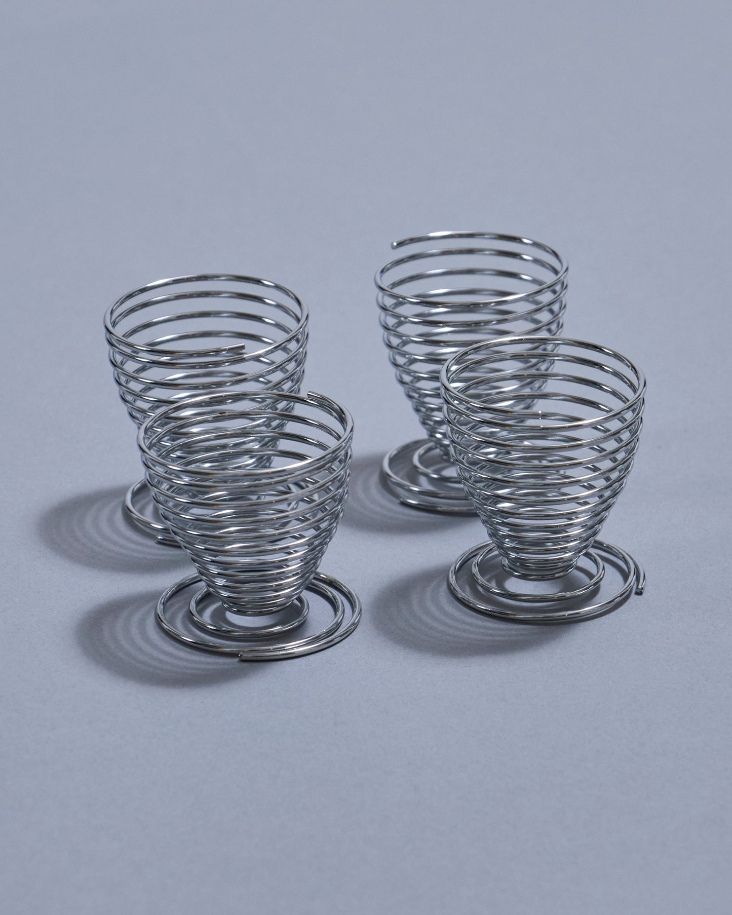 SET OF 4 METAL SPRING EGG CUPS