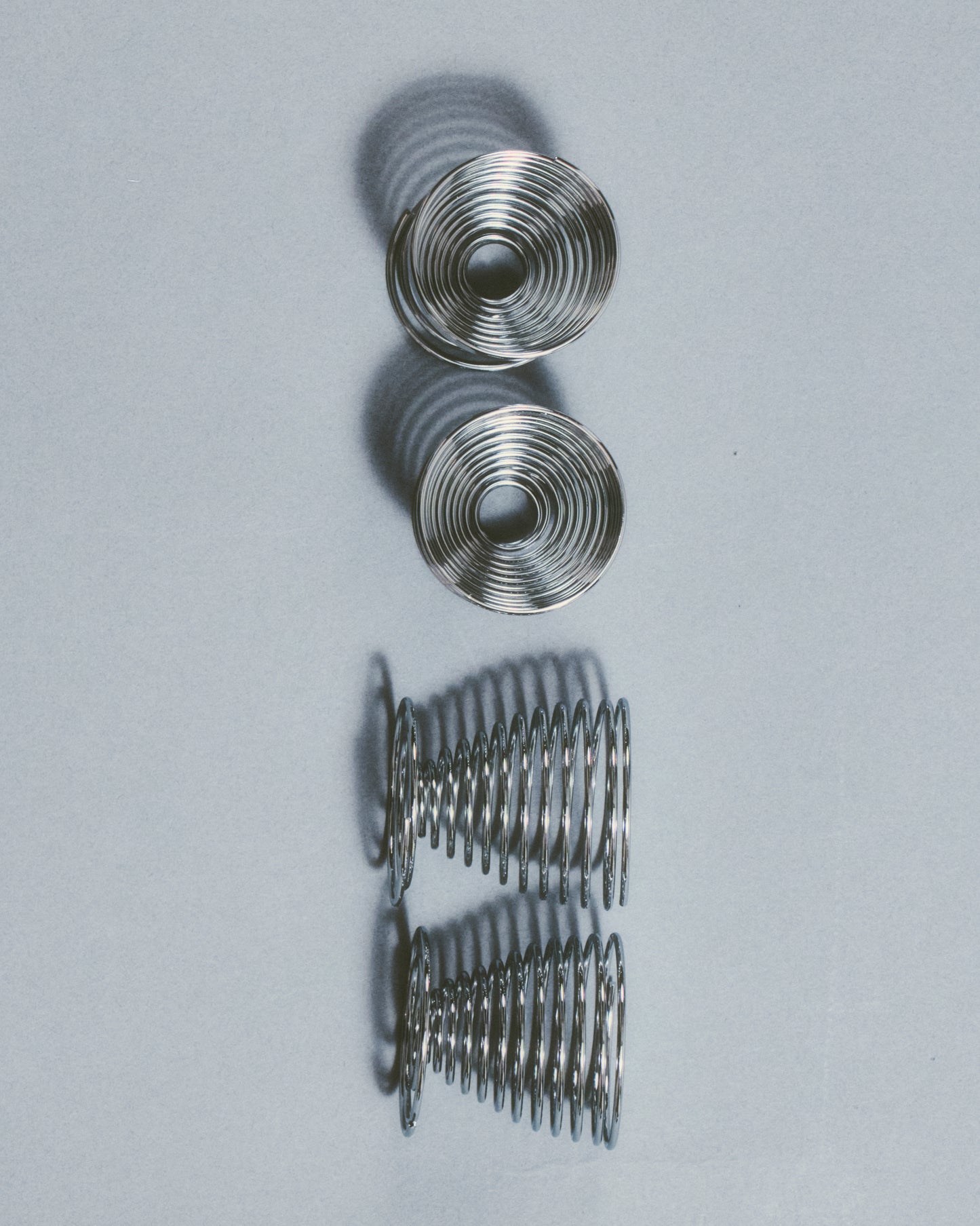 SET OF 4 METAL SPRING EGG CUPS