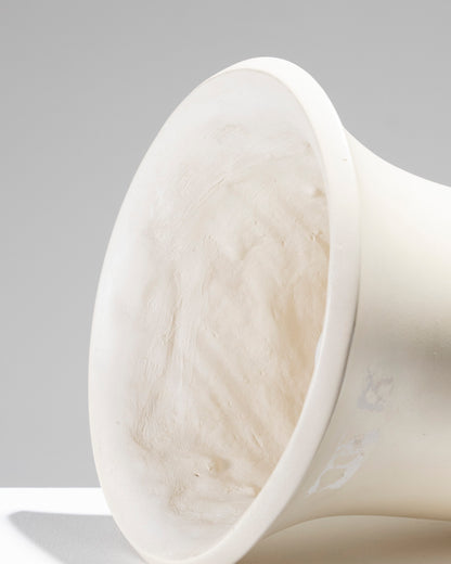 Luminous basin in white plaster