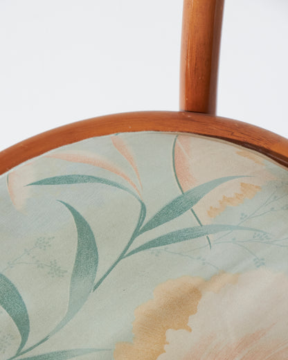 Rattan chair and blue flowery fabric