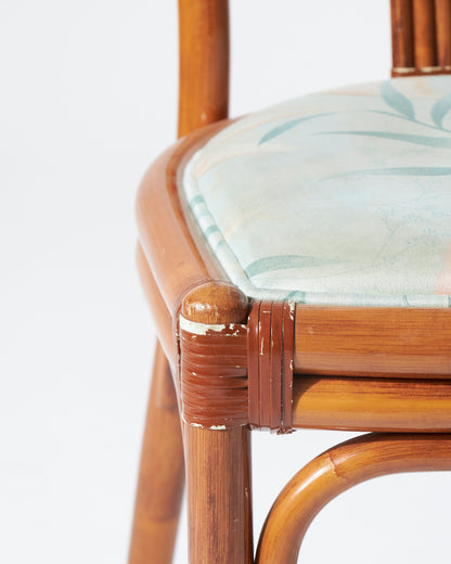 Rattan chair and blue flowery fabric