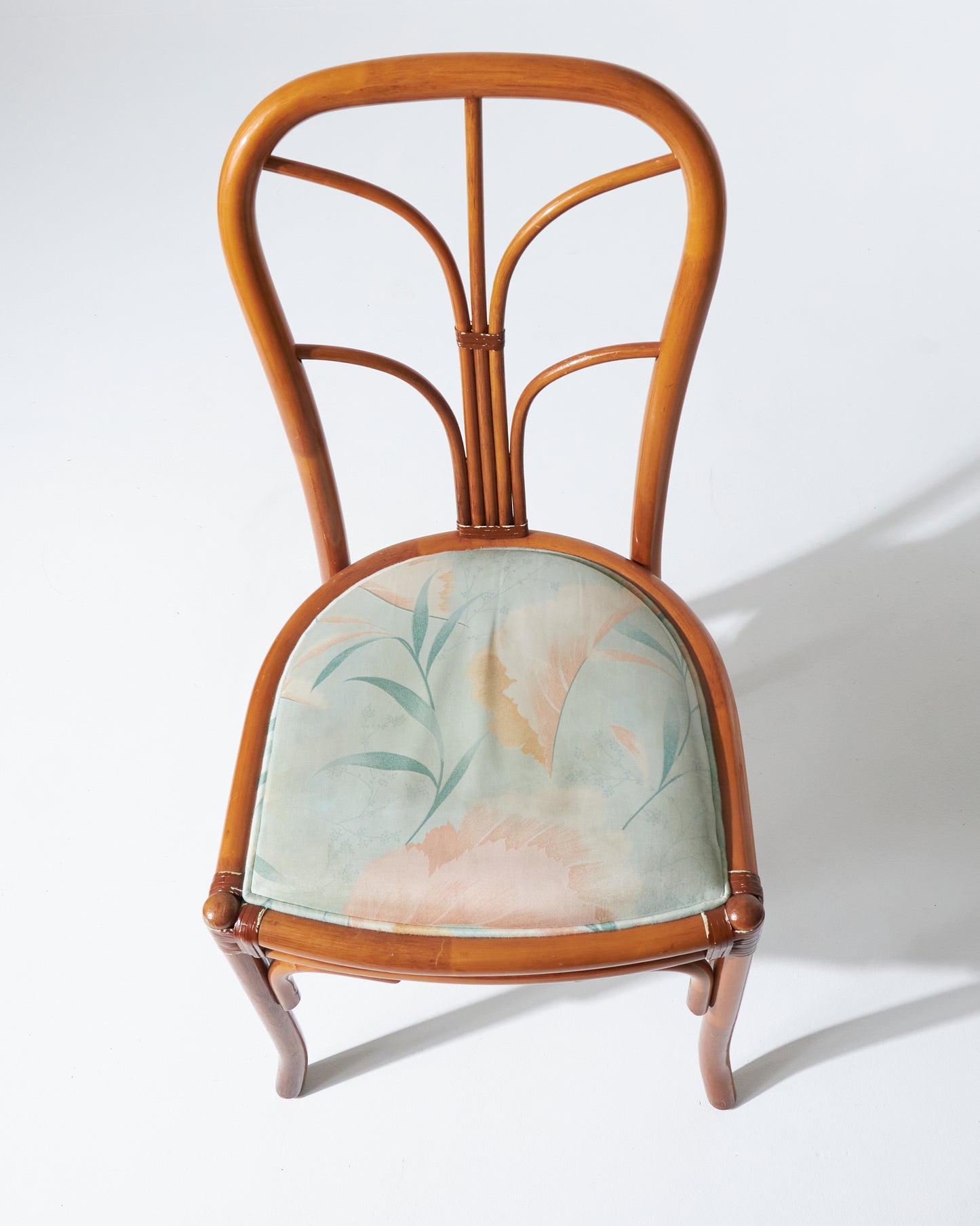 Rattan chair and blue flowery fabric