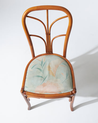 Rattan chair and blue flowery fabric