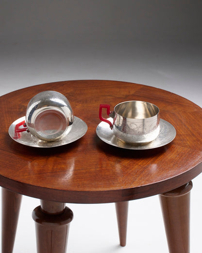 PAIR OF SILVER-PLATED METAL AND BAKELITE CUPS, 1930s