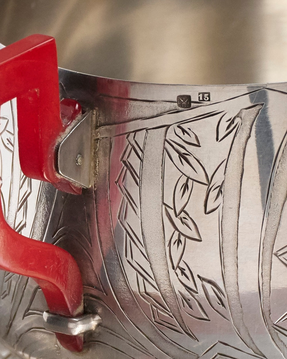 PAIR OF SILVER-PLATED METAL AND BAKELITE CUPS, 1930s