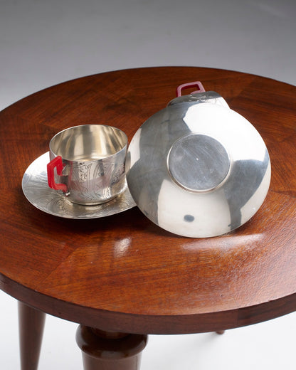 PAIR OF SILVER-PLATED METAL AND BAKELITE CUPS, 1930s