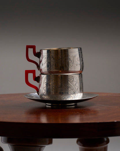 PAIR OF SILVER-PLATED METAL AND BAKELITE CUPS, 1930s
