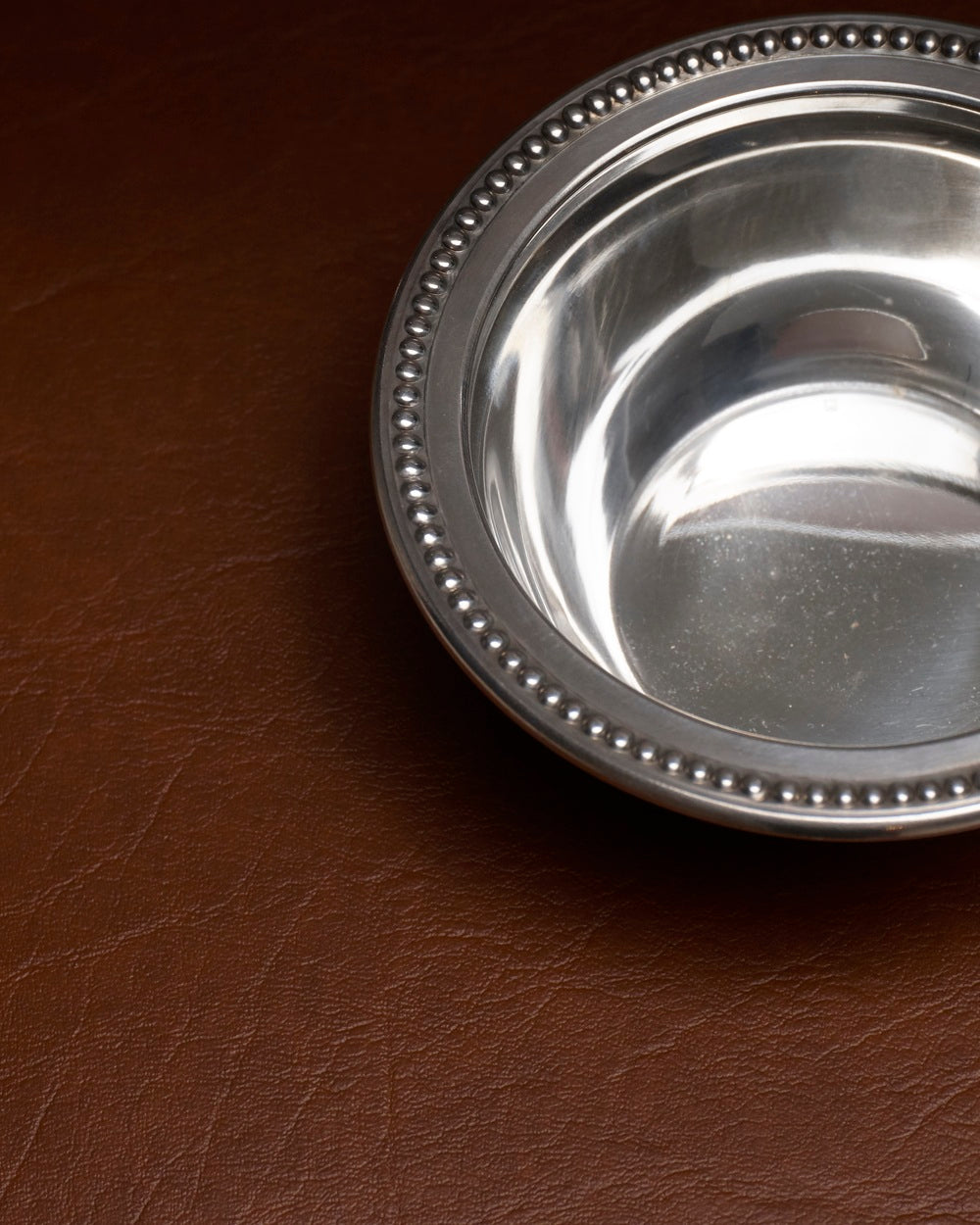 Silver-plated metal cup with silver torch, 1950s