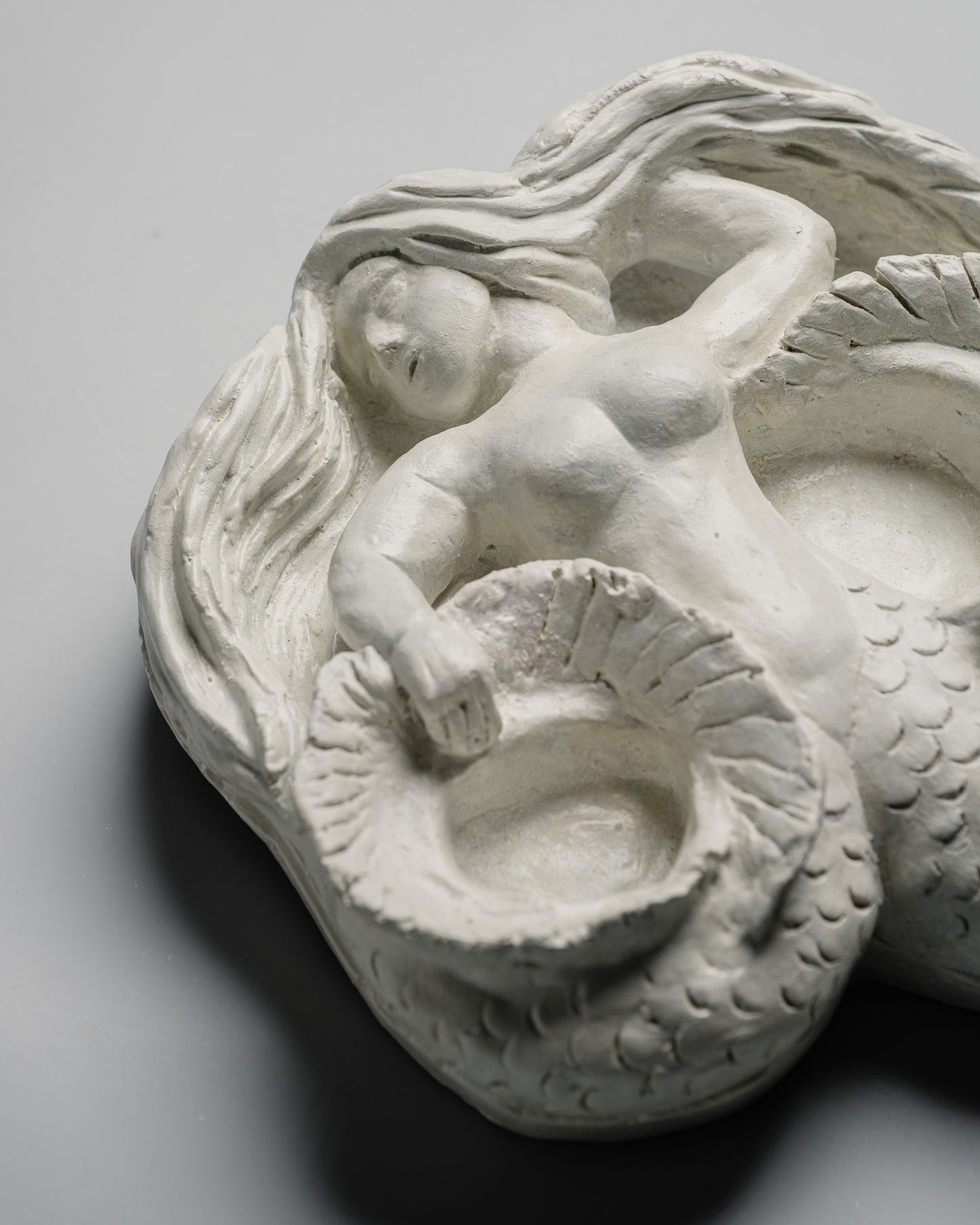 PLASTER LOW RELIEF SCULPTURE OF A MERMAID, 1940s