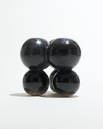 TABOURET AWKWARD EN GRÈS NOIR MÉTALLIQUE