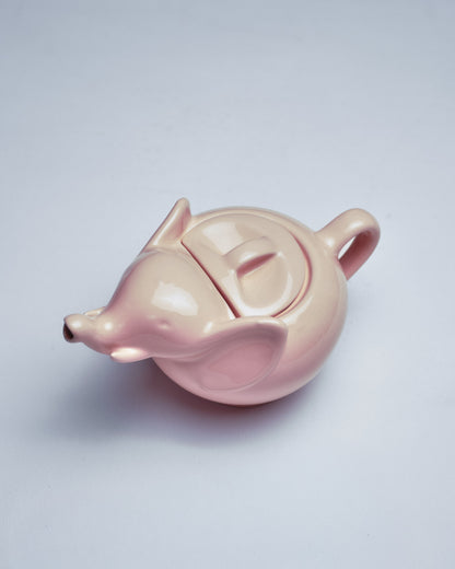 Théière en céramique rose, en forme d'éléphant stylisé. Très bon état.