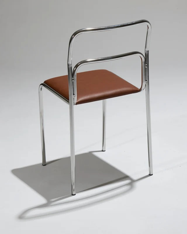 PAIR OF TUBULAR STEEL CHAIRS AND LEATHER, 1980S