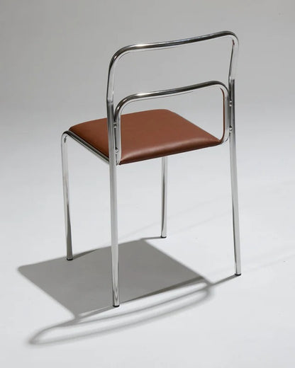 PAIR OF TUBULAR STEEL CHAIRS AND LEATHER, 1980S